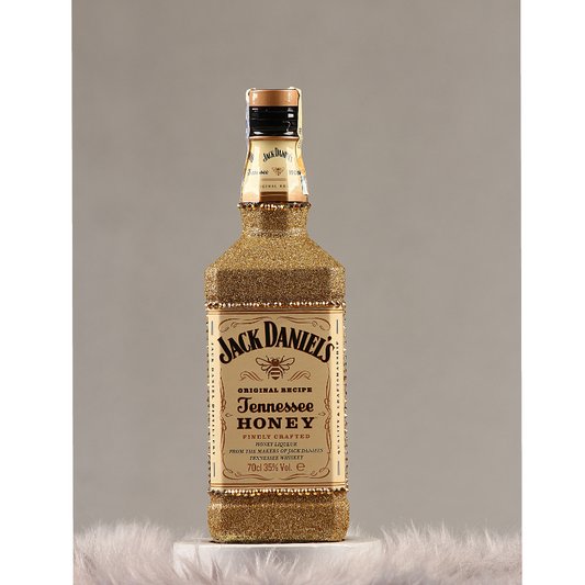 Jack Daniel's Honey décoré de paillettes dorées